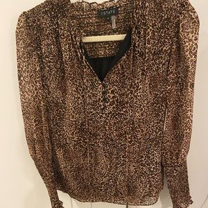 1. State cheetah print blouse